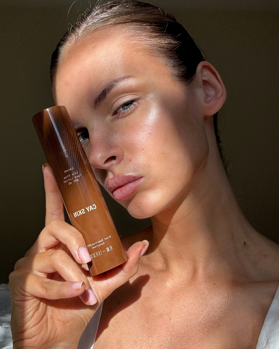 Wk 2 hero — Face SPF on model
